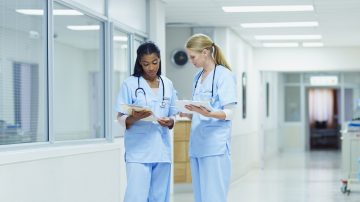 healthcare professionals looking at chart