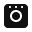 Square-shaped smart bridge in white with a central circular button, compact design and matte finish, no visible ports.