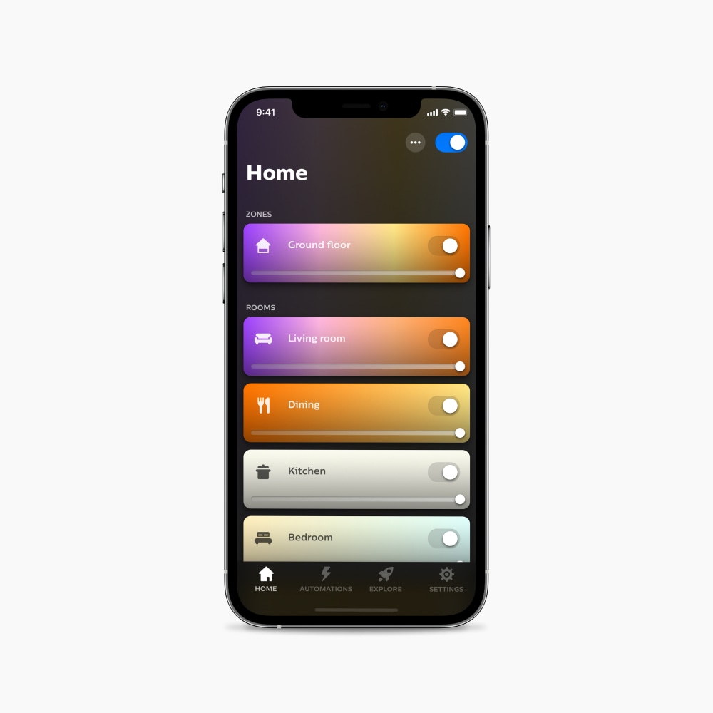 Smart lighting app interface on a phone showing zone and room controls, toggles, brightness sliders, and navigation buttons.