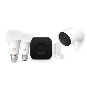Two Philips Hue smart bulbs, a Hue Bridge Pro, two Hue contact sensors, and Hue wired secure camera in white. 