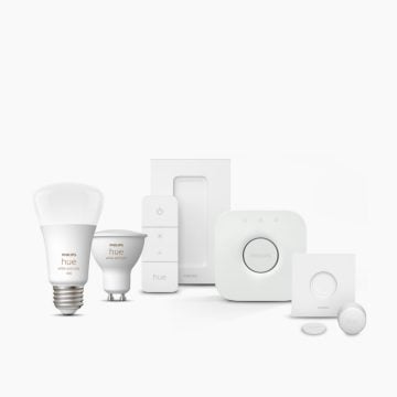 En samling av Philips Hue-lampor, Hue Bridge och en smart spotlight